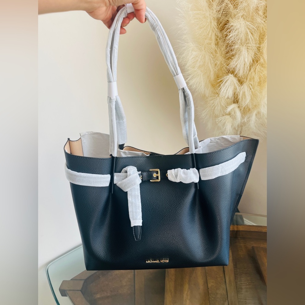 Michael Kors Black Tote with Gold Accents and Spacious Design